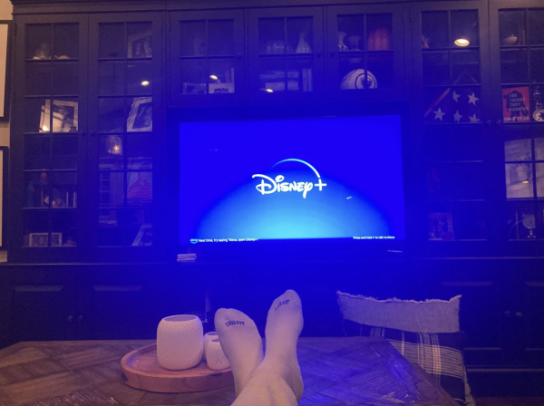 Binge-watching can serve as a form of stress relief as you settle down to watch a TV series on Disney+.